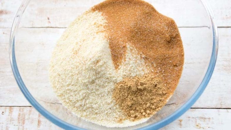 Bowl with mixed dry ingredients on table.